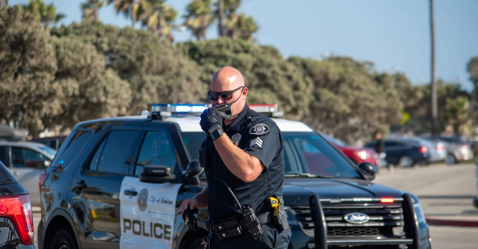 Police with Motorola APX-radio scaled - public-security